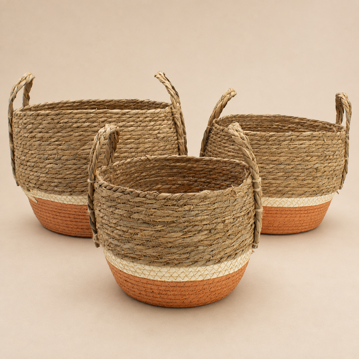 Trio de paniers Caléa tressés en fibres naturelles avec base terracotta
